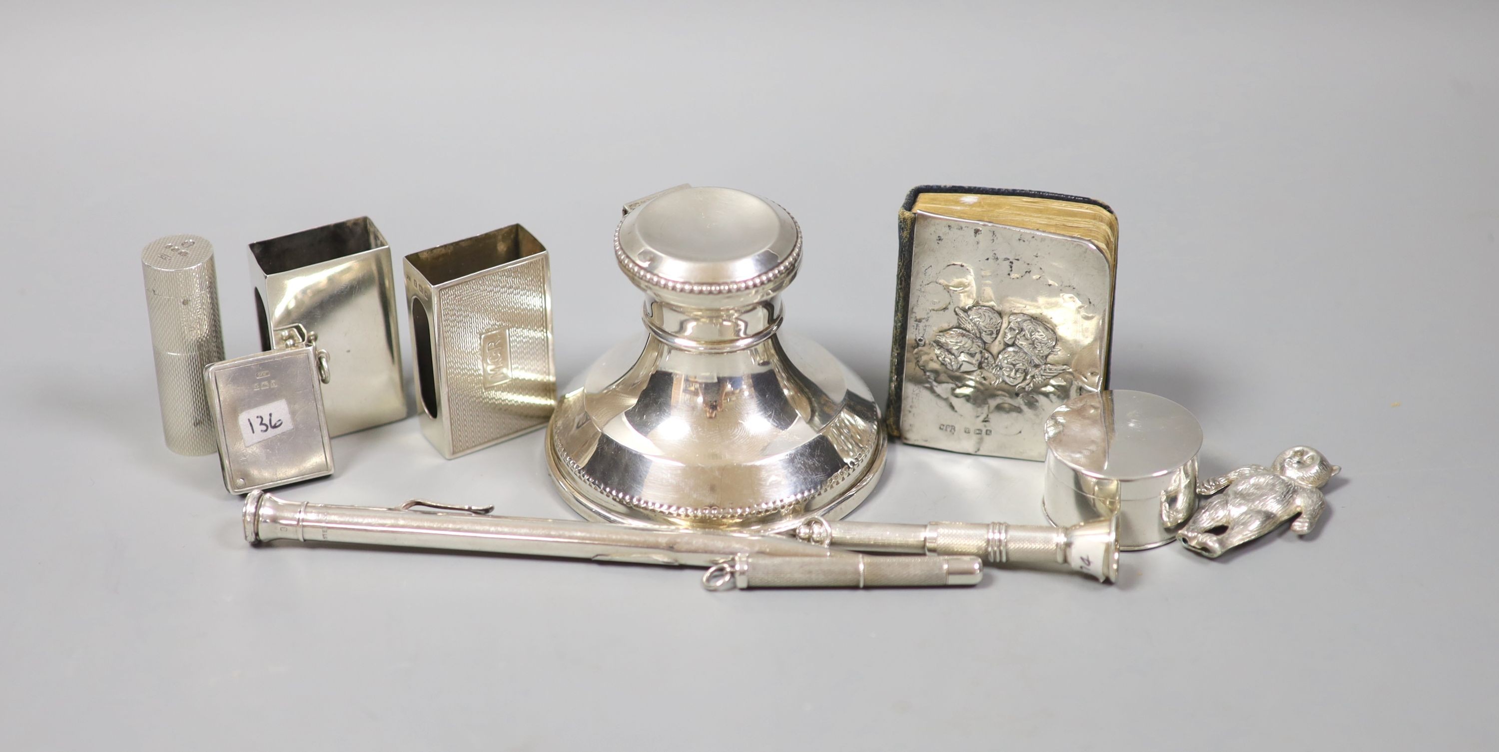 A silver mounted small inkwell, a silver mounted prayer book and other small silver including match sleeves, lipstick holder, cigar piercer, pen and Georgian pill box by Phipps & Robinson.